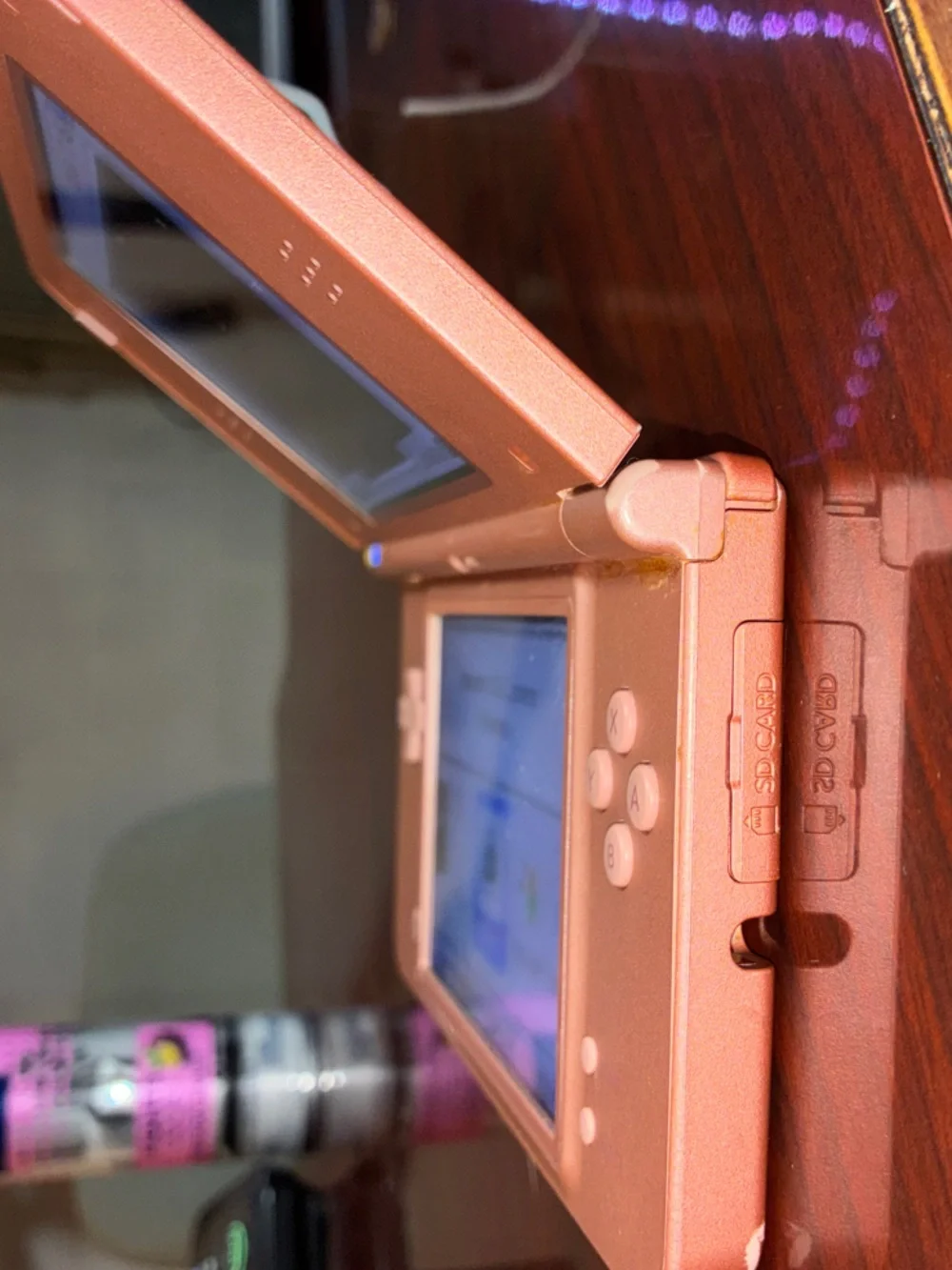 Nintendo DSi Portable Gaming Console in Metallic Copper 2008.